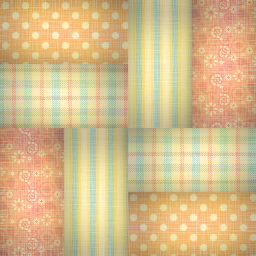 A pastel quilt texture with different cloth patterns.
